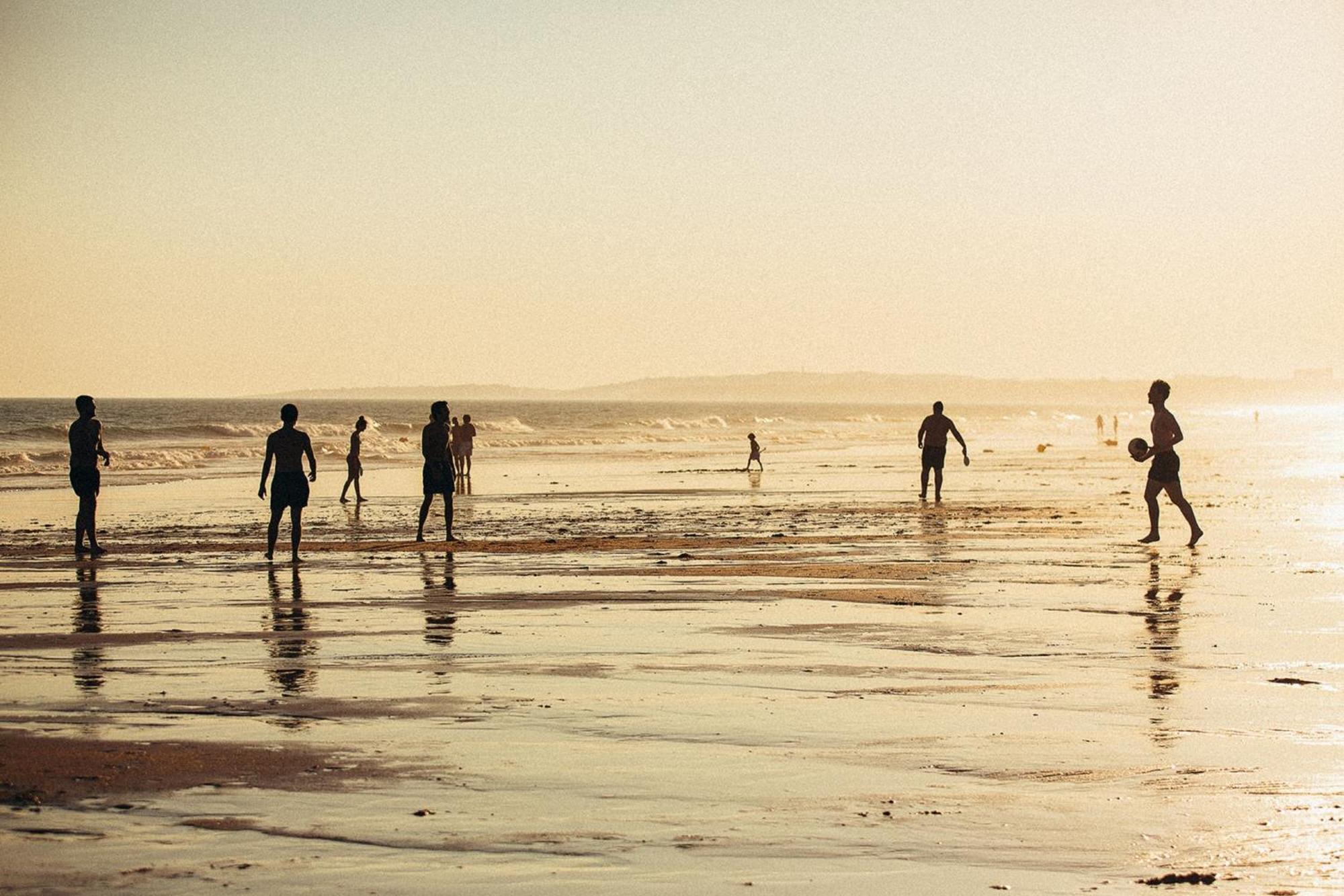 Domes Lake Algarve, Autograph Collection Vilamoura Eksteriør bilde Children playing football on the beach