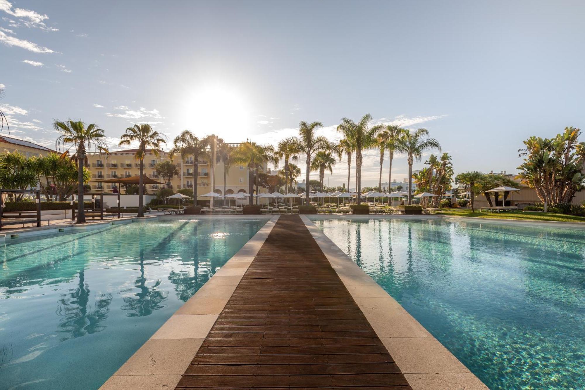 Domes Lake Algarve, Autograph Collection Vilamoura Eksteriør bilde The swimming pool at the resort